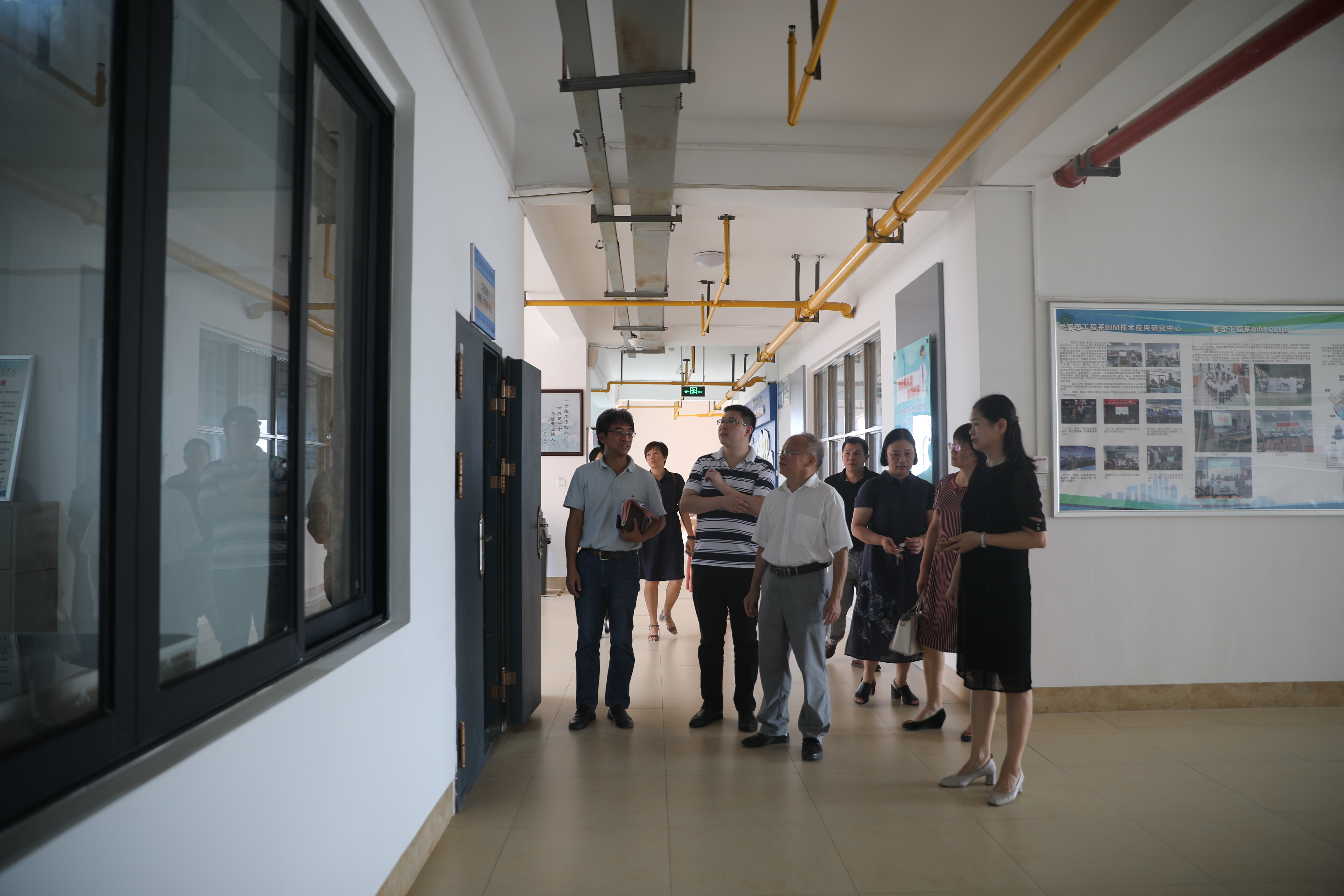 专家组走访sports工程造价专业群发展研究基地